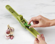 Load image into Gallery viewer, Duo Easy-Clean Garlic Press w/Wiper Blade